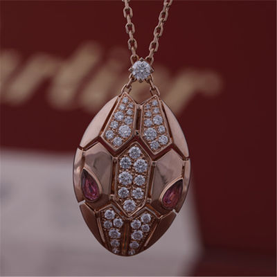 Kualitas Kalung Roman Serpenti dalam emas mawar 18 kt dengan mata rubellite dan dengan berlian pavé di kepala pabrik