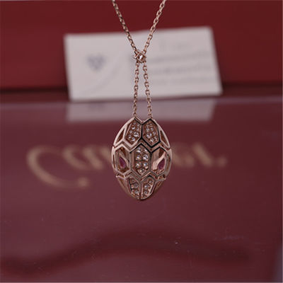 Kualitas Kalung Roman Serpenti dalam emas mawar 18 kt dengan mata rubellite dan dengan berlian pavé di kepala pabrik