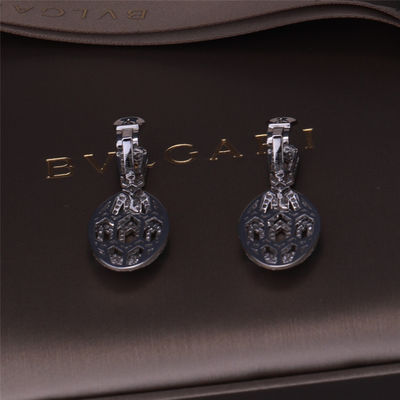 Kualitas Anting Serpenti Merk Emas Mewah dalam Emas Putih 18K yang ditata dengan Mata Zamrud dan dengan berlian pavé Kepala Ular pabrik